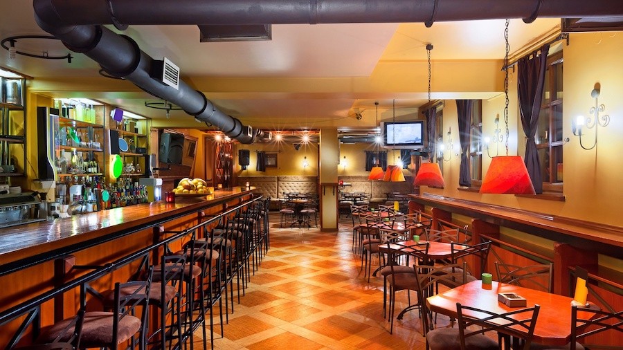 A restaurant space equipped with commercial audio-video solutions.